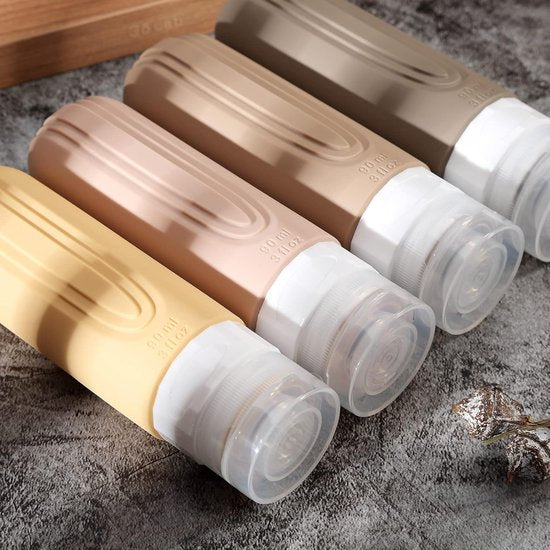 EverNeeds Reisflesjes Met Etui - Navulbaar - Siliconen Reisflesjes Handbagage - Licht Apricot - 4 Stuks