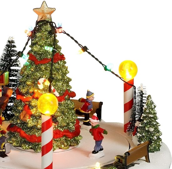 Luville Kerstdorp Kerstboomscène met Schaatsbaan - Kerstversiering met Bewegende Figuren en LED-verlichting - Guirlande op Batterijen - Kerstslingers voor Binnen - 22 x 22 x 18,5 cm - Wit