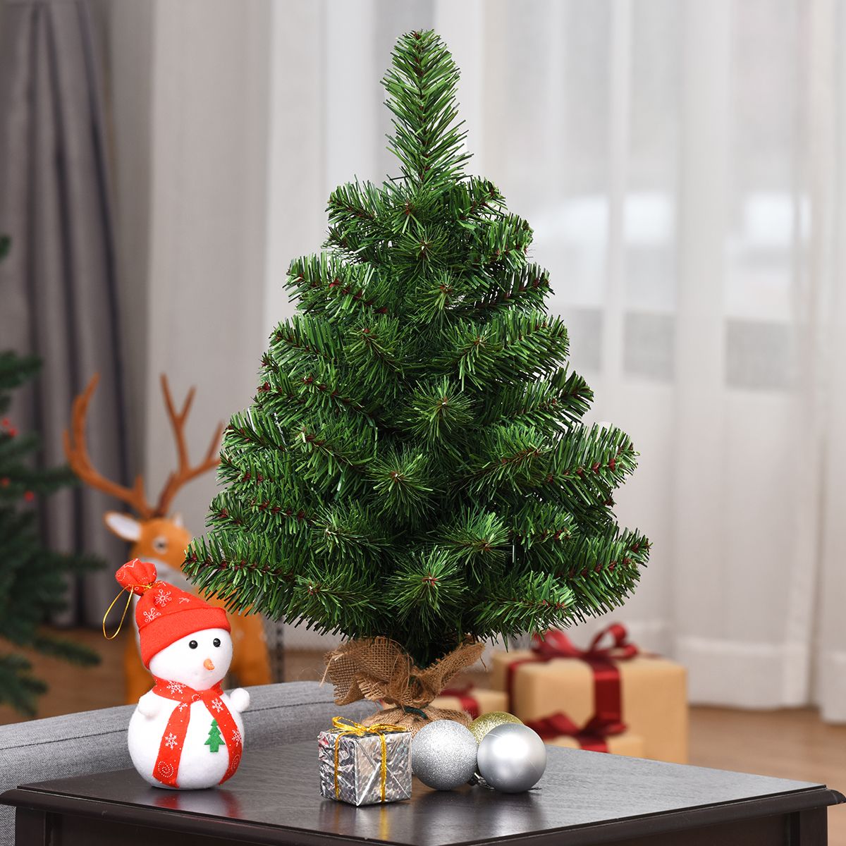coast kunstkerstboom dennentak pvc - 60 cm - groen - cementvoet - volle levensechte takken