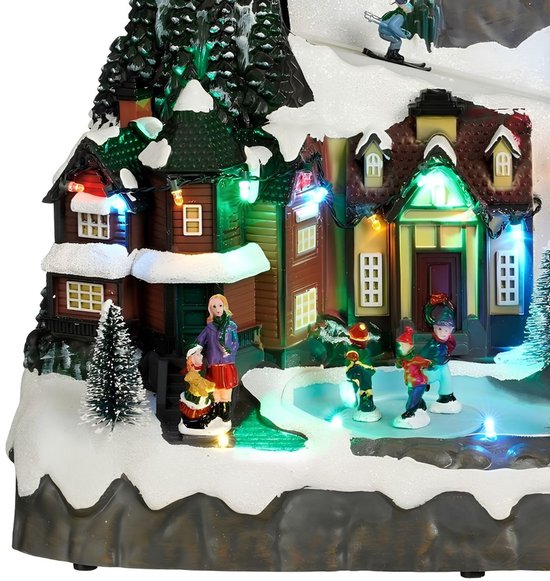 Luville Kerstdorp Miniatuur Dorpsplein - Kerstversiering met Schaatsende Bewoners - Kerst Decoratie met LED-verlichting en Draaiende Figuren - L34 x B18 x H24 cm - Wit