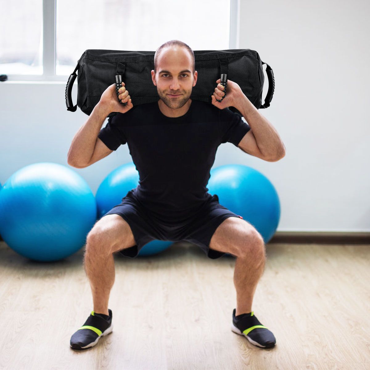 Coast Powerbag Trainingszandzak - verstelbaar gewicht - 6 handgrepen - zwart/geel