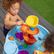 Step2 Spiral Slide Watertafel 66 x 66 x 57,1 cm – Blauw/Rood – 13-delige Accessoireset