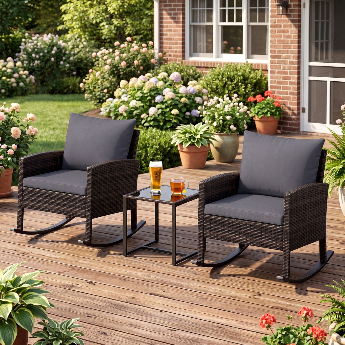 Coast 3-delige tuinset - 2 schommelstoelen en bijzettafel - handgevlochten rattan - grijs