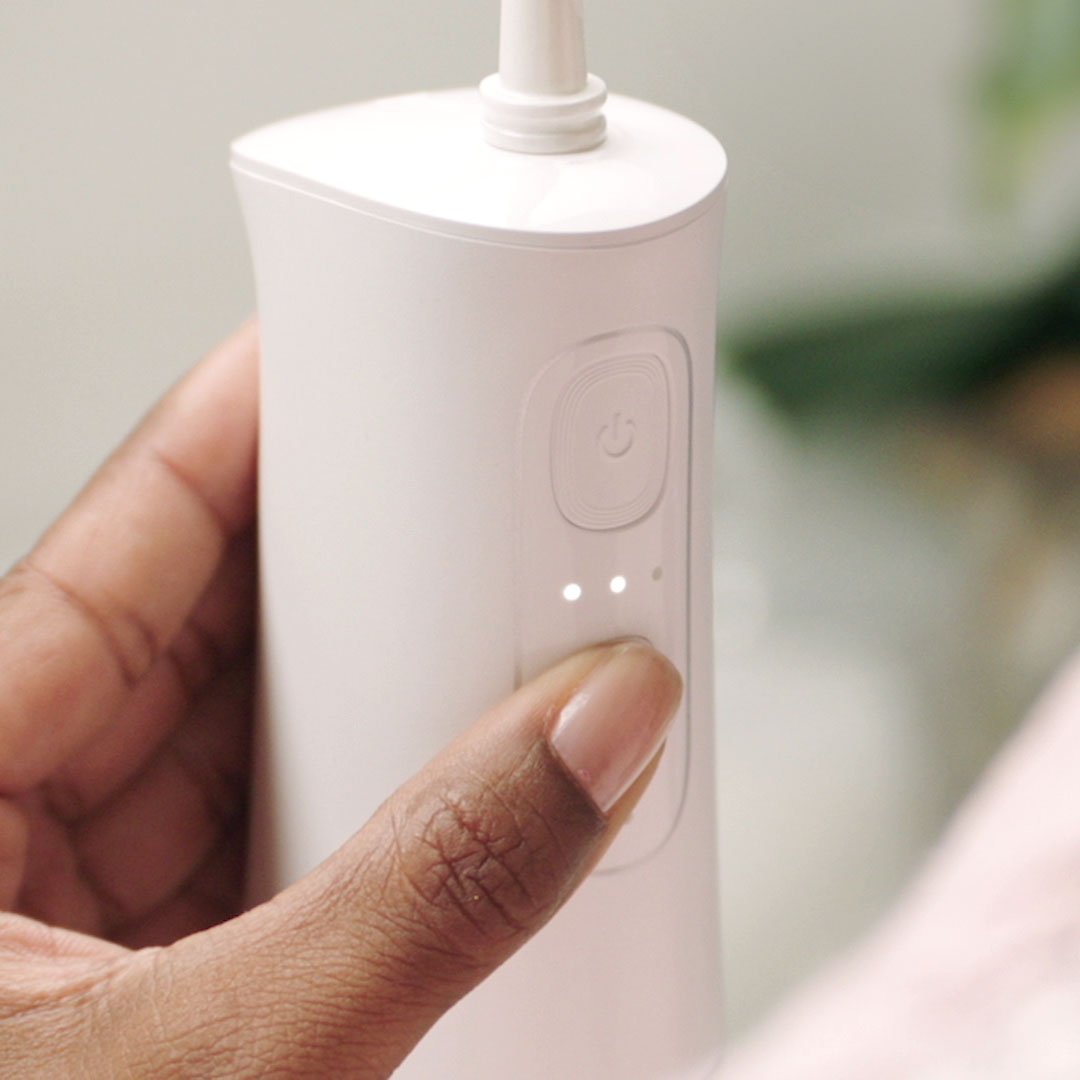 CorpCare MiracleSmile elektrische monddouche - H-vormige floskop - Draadloos ontwerp - Handige watertank