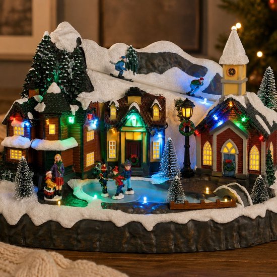 Luville Kerstdorp Miniatuur Dorpsplein - Kerstversiering met Schaatsende Bewoners - Kerst Decoratie met LED-verlichting en Draaiende Figuren - L34 x B18 x H24 cm - Wit