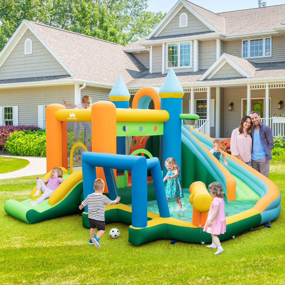 Coast Opblaasbaar Waterpark Springkasteel - 2 Glijbanen, Klimwand, Waterwerper, Max. 90 kg - 463 x 395 x 251 cm - Oxford/PVC - Veelkleurig